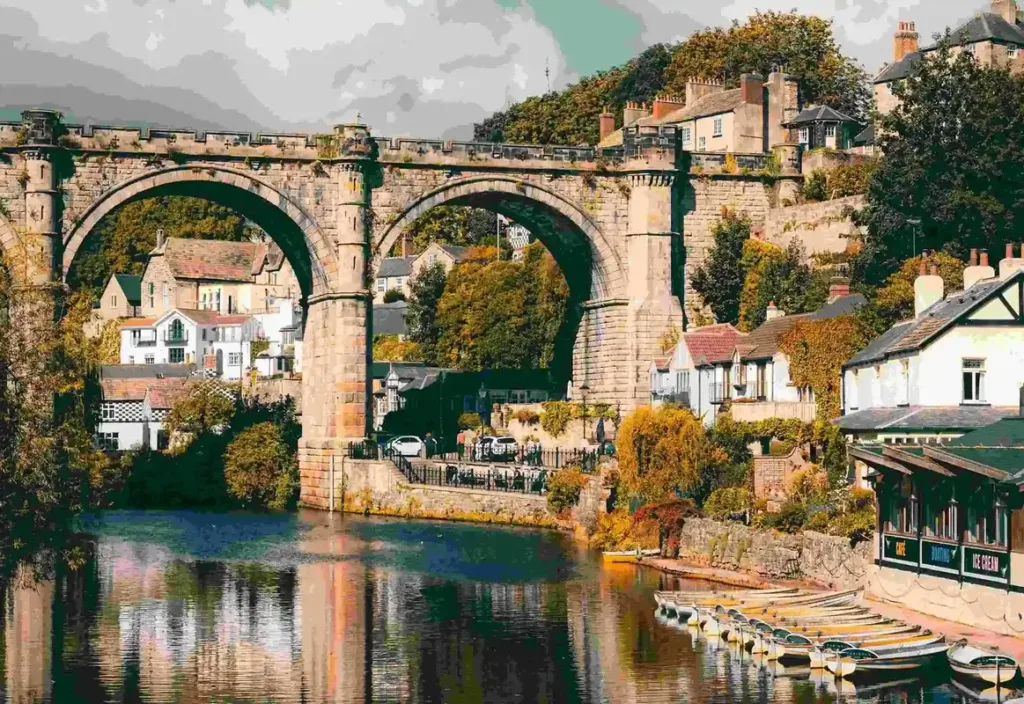 Bridge over a river with a town on the banks