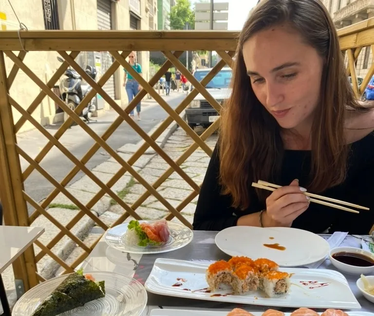 girl eating sushi 