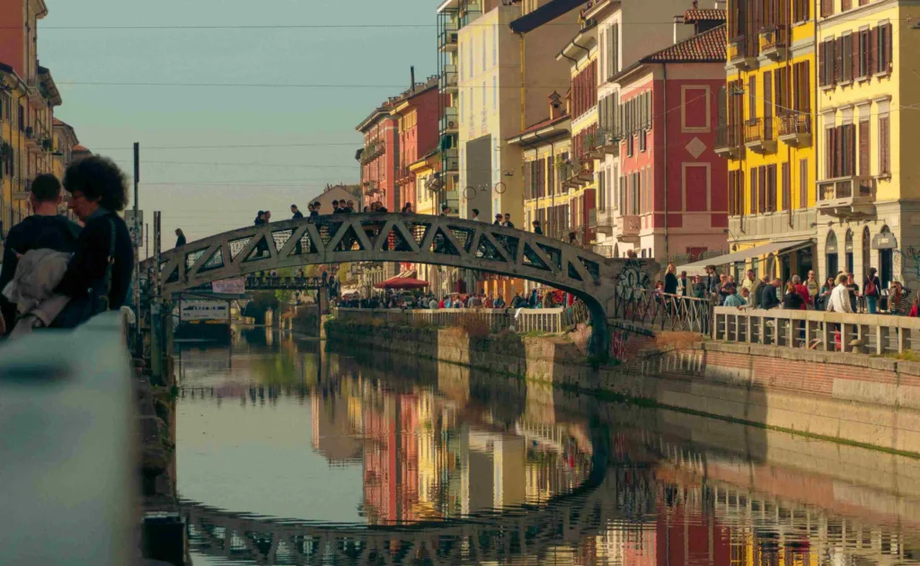 view of a canal and bridge at sunset