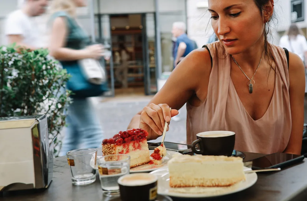 woman eating cake