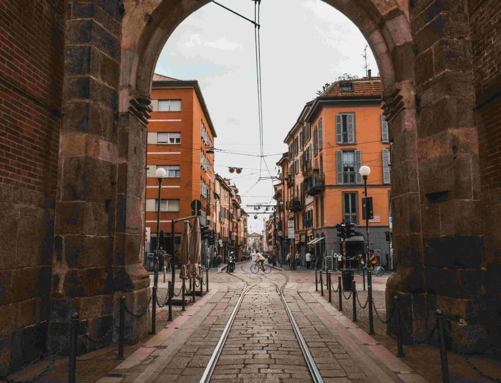 View of a city street through an archway